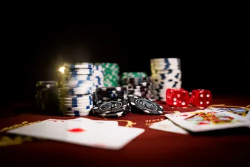 A professional dealer in a tuxedo greeting players at the roulette table, symbolizing the authentic live casino feel at 777BED.