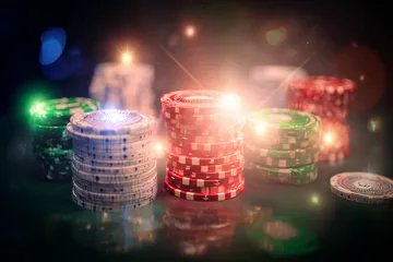 A close-up shot of golden coins falling around a spinning roulette wheel, representing immersive casino action at 777BED.